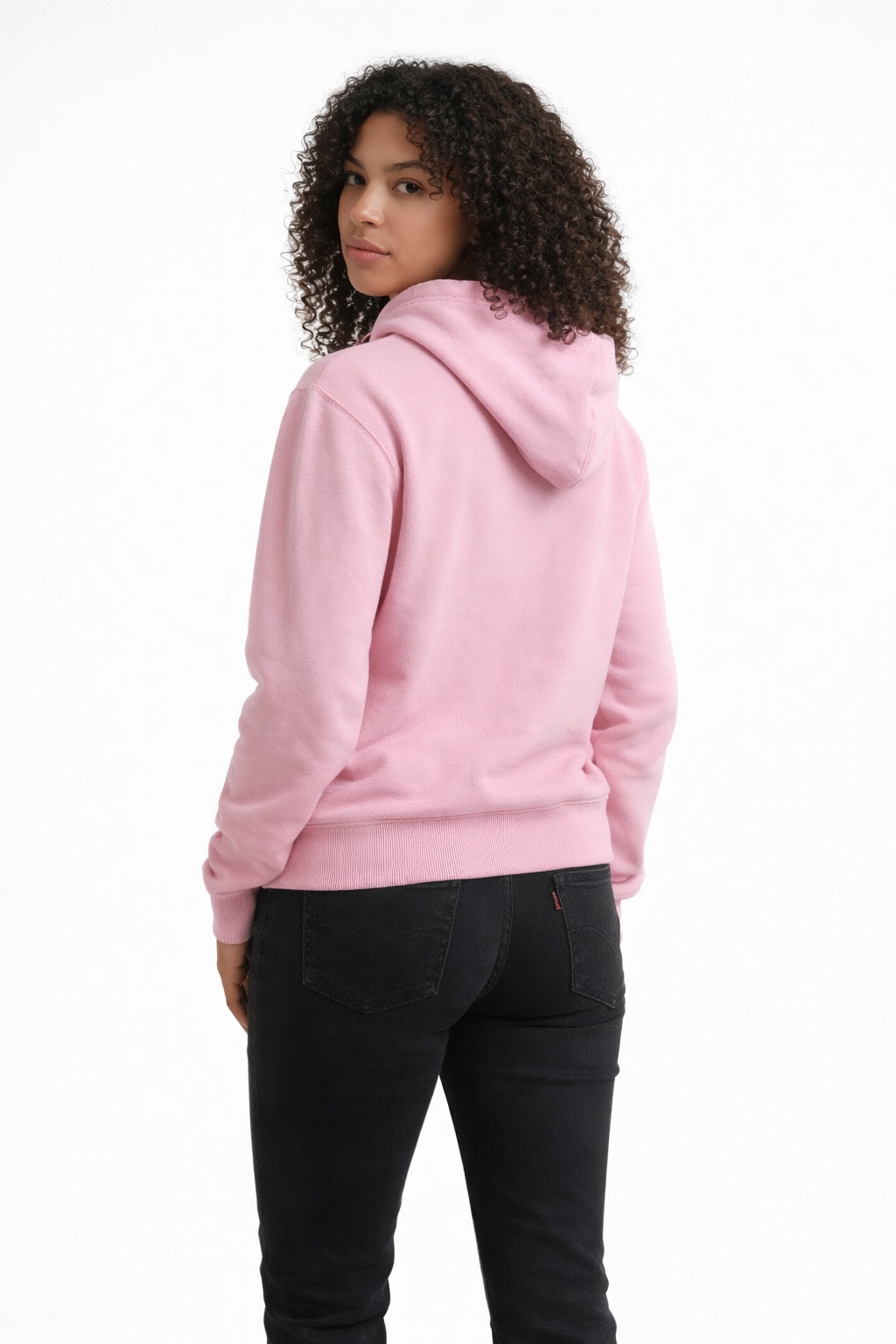 Person wearing a pink hoodie on a white background