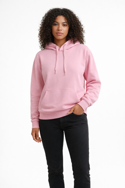 Person wearing a pink hoodie on a white background