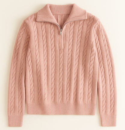Pink cable knit sweater on a light beige background