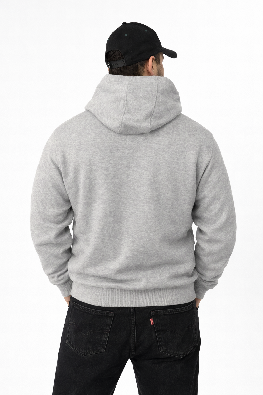 Person wearing a gray hoodie and black cap from behind on a white background