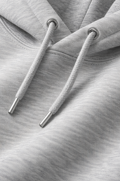 Close-up of gray hoodie strings on a textured gray background